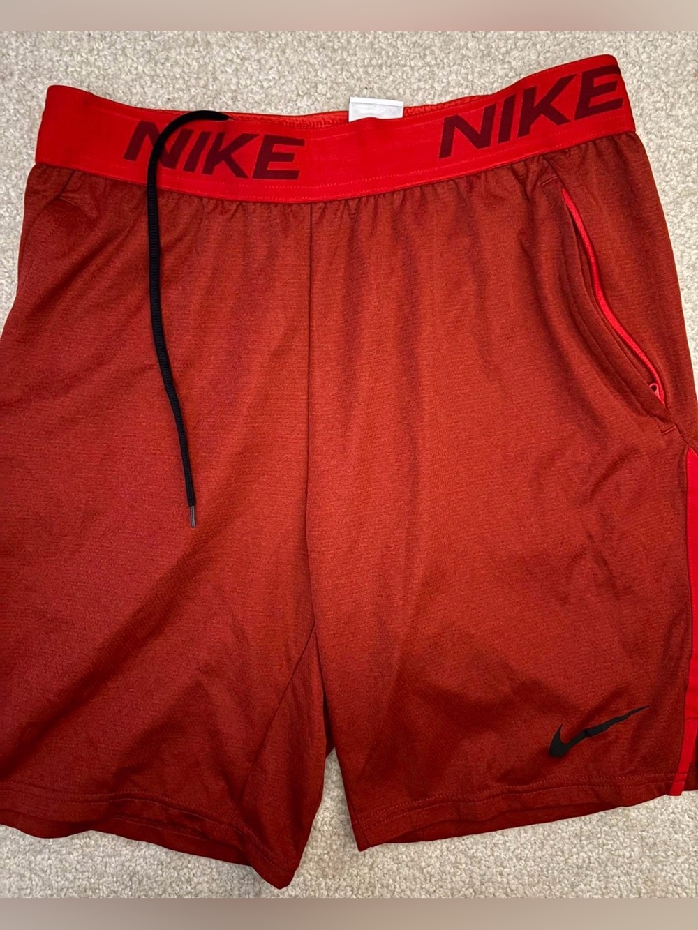 Nike Men’s Red Athletic Shorts with Black Swoosh